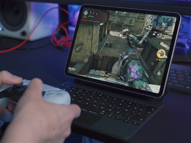 Player at an RTX battle station on the Nova Arena floor